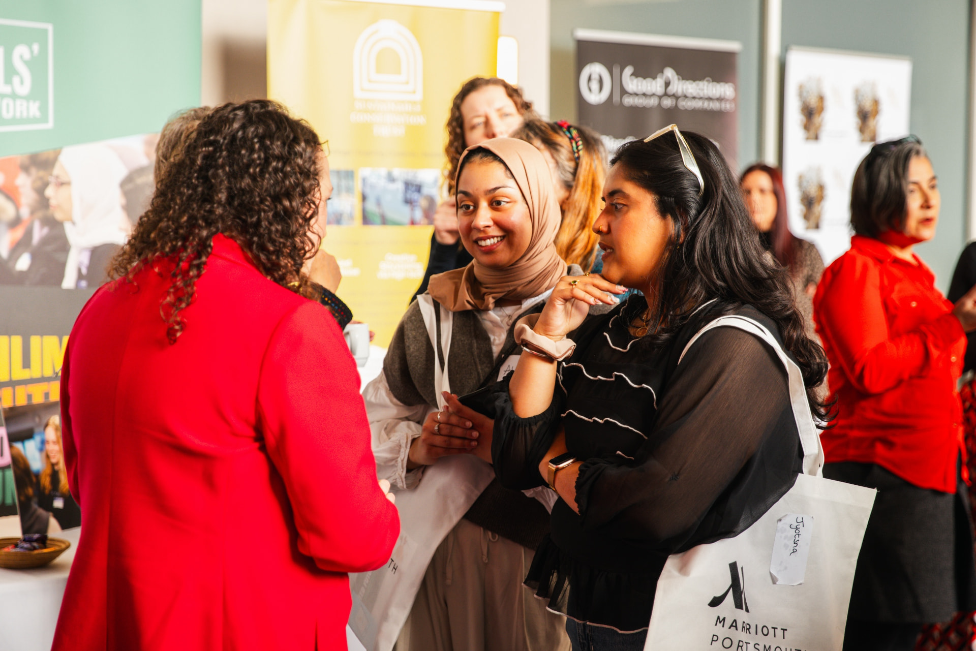 Founders and business owners talking together at a Startup Disruptors community event